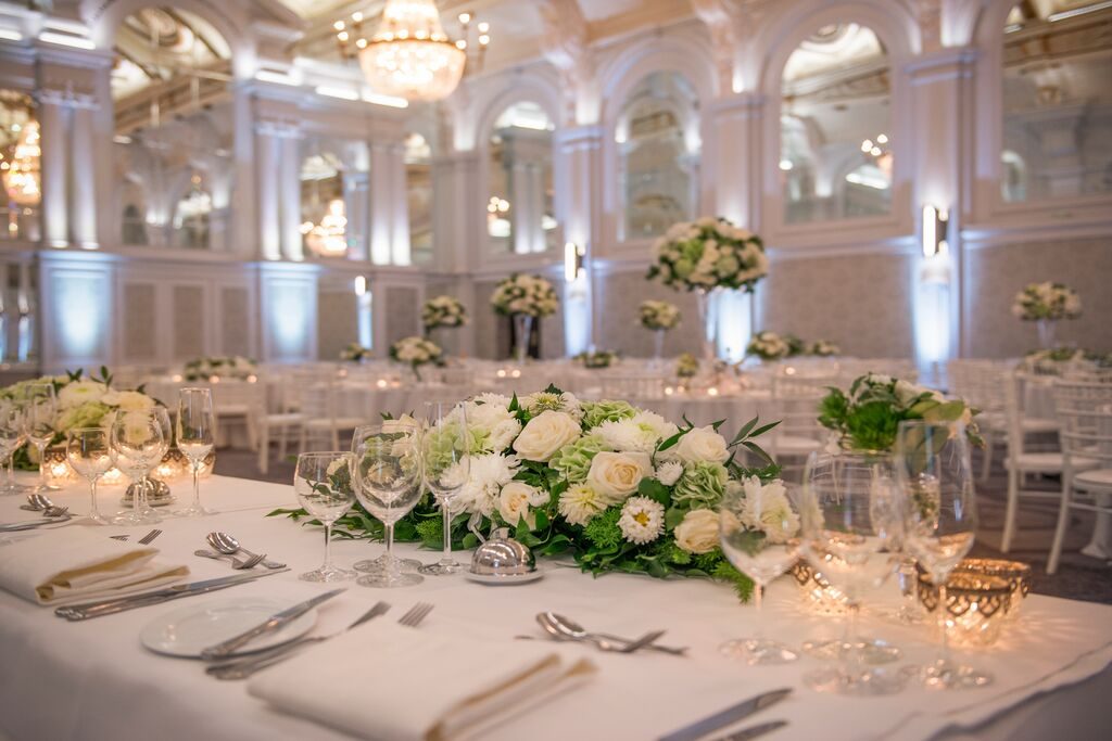 Close table detail in the Grand Hall, glassware and florals